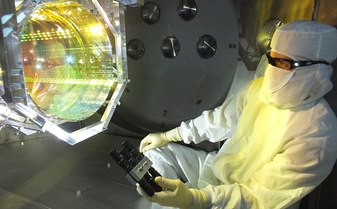 Scientist Inspecting LIGO Optics