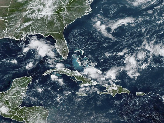 AI Weather map showing the eastern US and the Caribbean with a hurricane appreoaching.