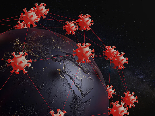 Illustration of covid virus particles orbiting the globe in the dark. Credit: Getty Images.