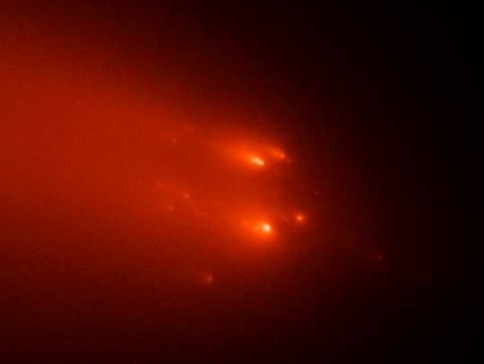 The ATLAS comet breaking apart, as seen by the Hubble space telescope.