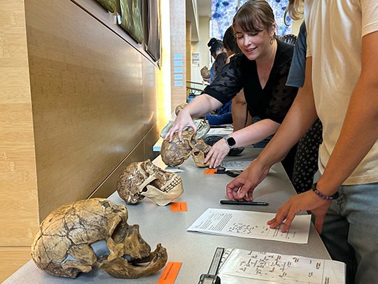 Senior Lecturer Kimberly Paczolt helps students with a hands-on activity during a class in October. Credit: Katie Bemb.