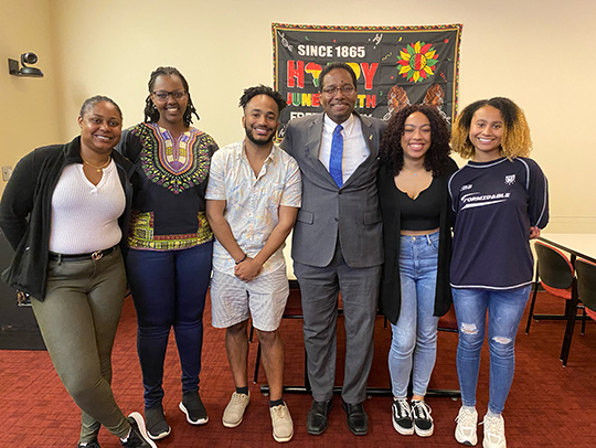 UMD President Darryll Pines with members of Black Scholars in Biology