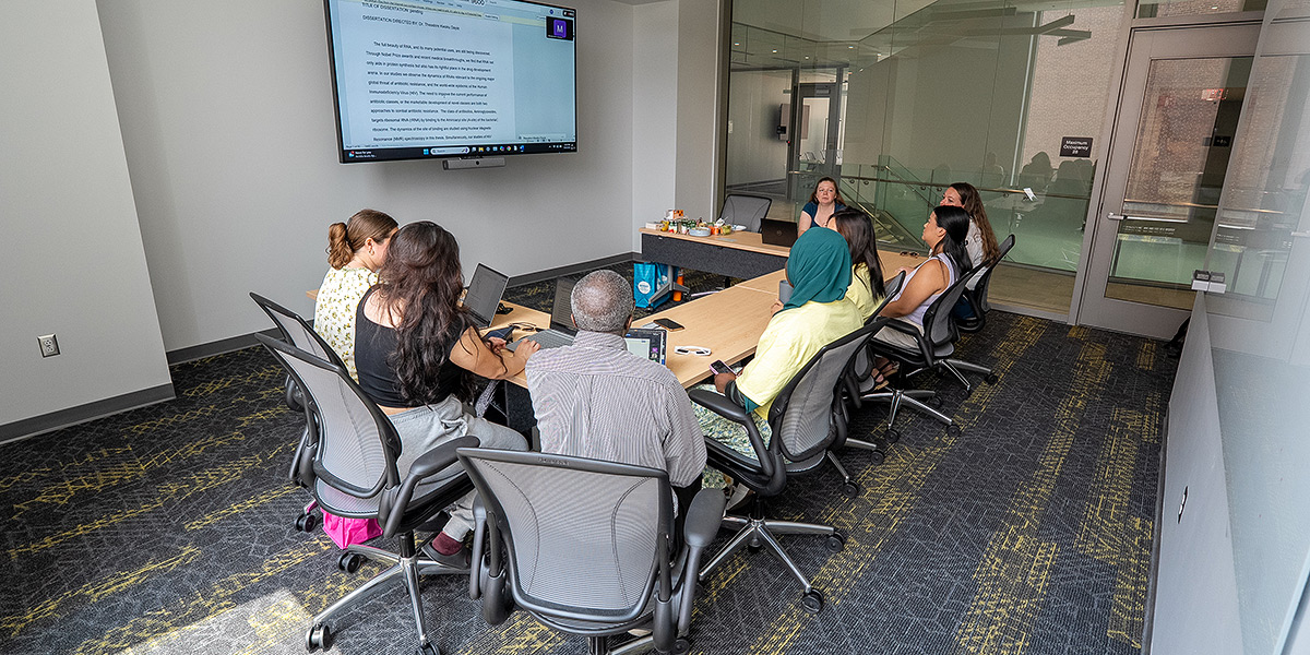 Kwaku Dayie and his research group in the recently-dedicated in Doyle Room. Credit: Mark Sherwood