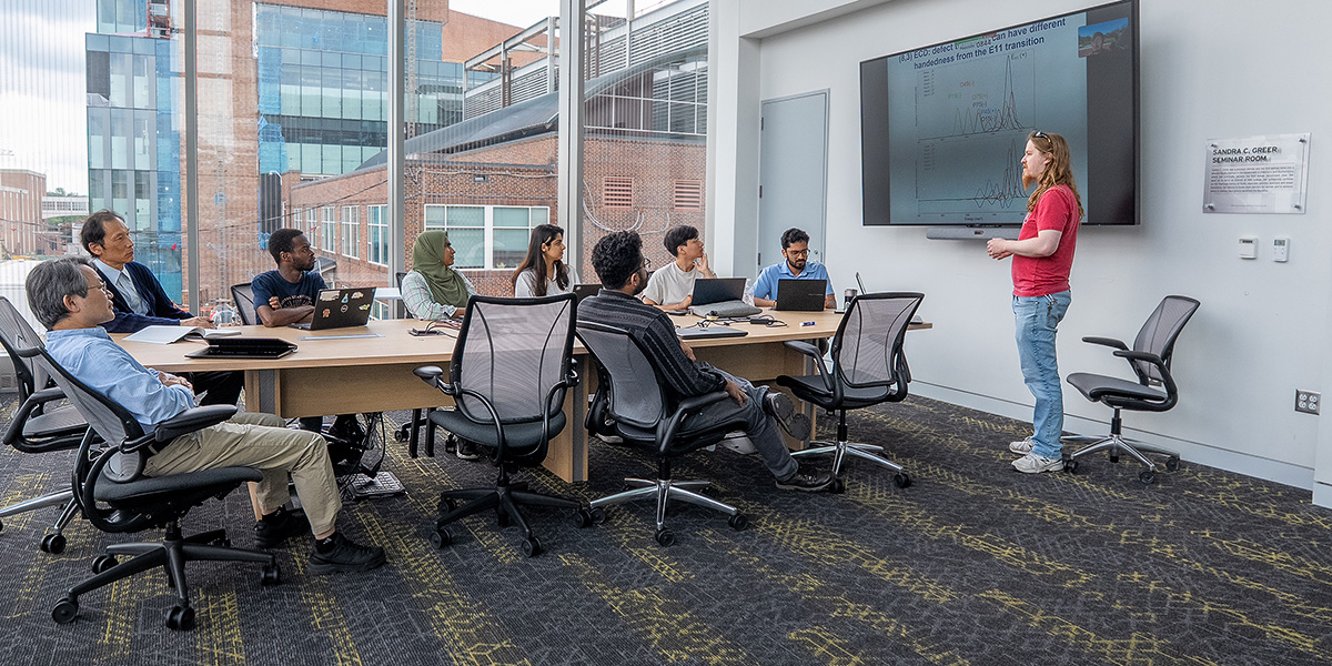 A research group in the newly-named Sandra C. Greer Meeting Room. Credit: Mark Sherwood