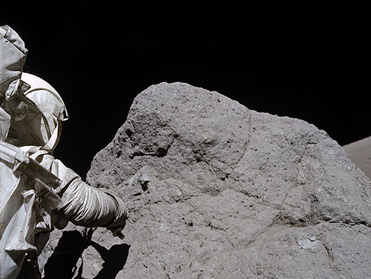 An Apollo 17 astronaut collects samples from a boulder on the moon. Credit: NASA/JSC/ASU An Apollo 17 astronaut collects samples from a boulder on the moon. Credit: NASA/JSC/ASU