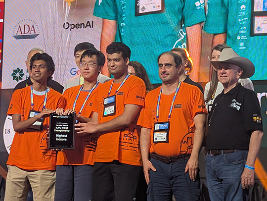 The UMD team on the stage at the ICPC awards ceremony