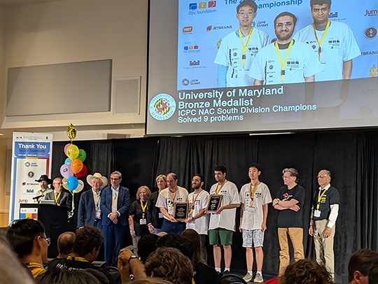 UMD's bronze medal-winning team onstage at the ICPC North America Championship. UMD's bronze medal-winning team onstage at the ICPC North America Championship.