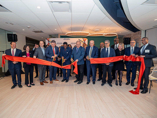 A ribbon-cutting ceremony at the IHC's new facility in Bethesda, Md. Credit: Mark Sherwood