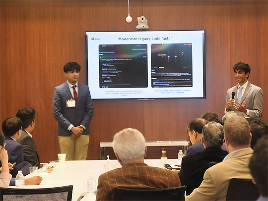 (L-R) Nand Vinchhi and Samai Patel giving a presentation