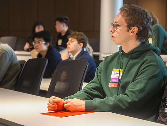 Proscpective CS Ph.D. students in an auditorium