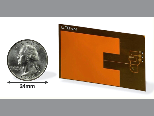 An ultra-low-power tracking system, LiTEfoot, which is shown to be not much larger than a quarter.