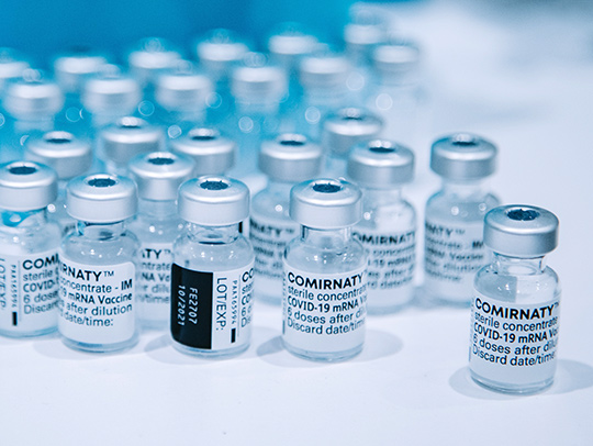 A collection of phials of vaccines. Photo credit: Mat Napo