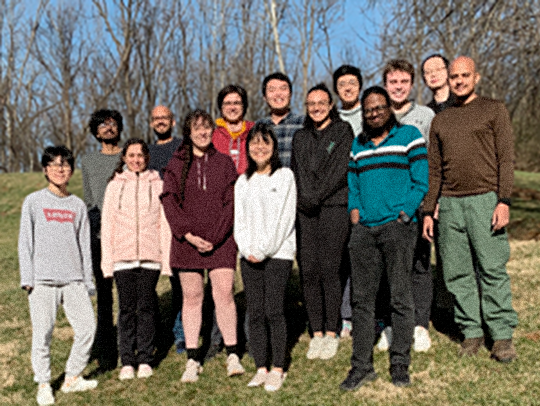Pratyush Tiwary and his research group, outside.