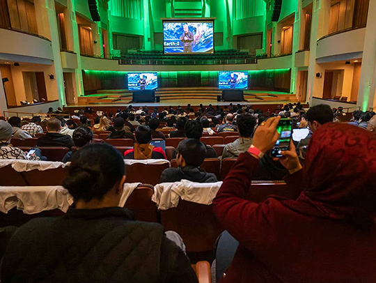 A view from the audience of the stage at the Nvidia AI event.