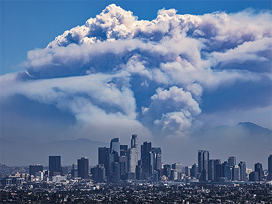 A pyrocumulonimbus cloud, generated by a wildfire, looms over Los Angeles in 2024. Credit: Ted Soqui-Sipa via AP Images.